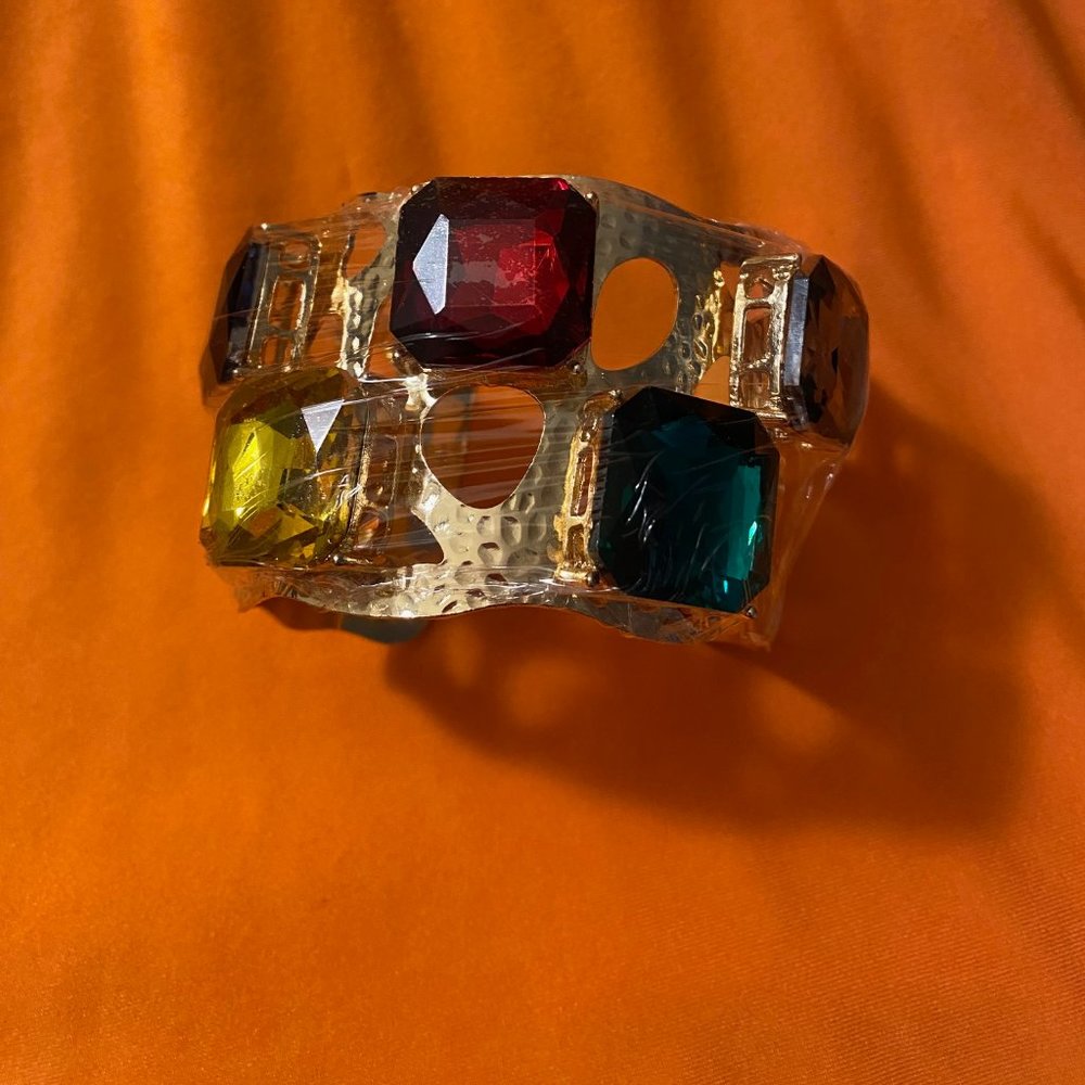 Brand New Chunky Gold Bracelet with blue, red, yellow, green, and black gems